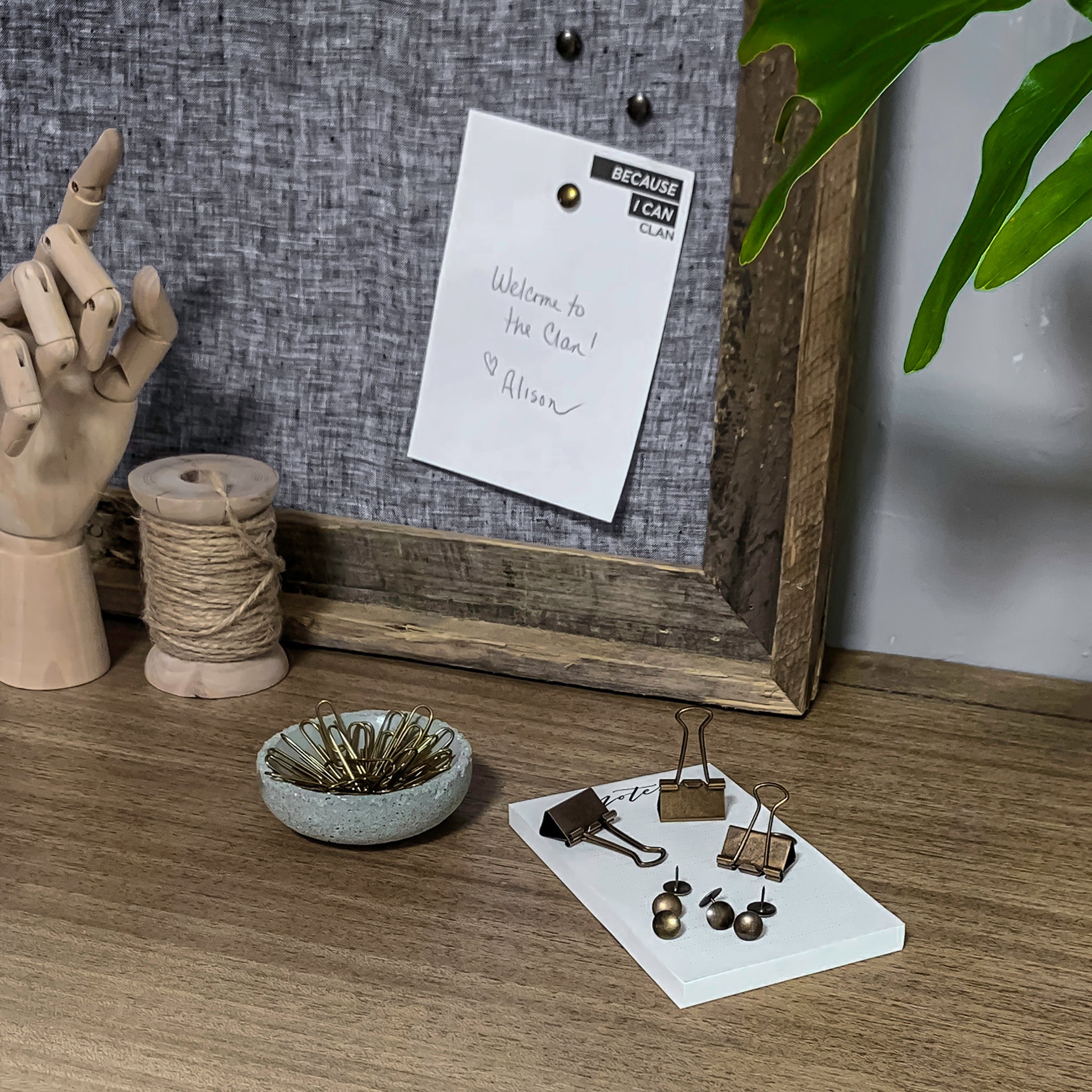 boho desk decor scene antiqued brass thumbtacks paper clips binder clips wood hand wood spool concrete dish linen pin board with pallet-wood frame