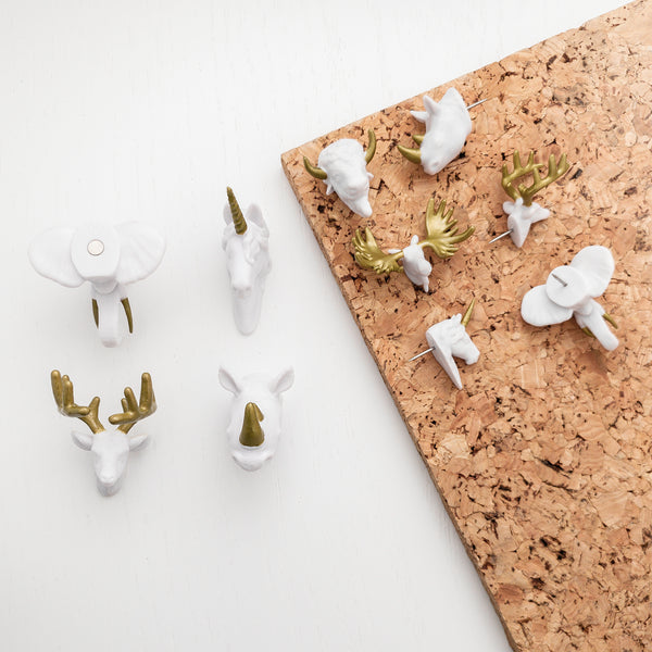 white and gold animal head push pins and magnets